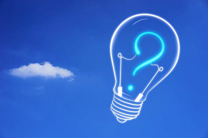 Graphic illustration of a lightbulb with a question mark in it against a blue sky